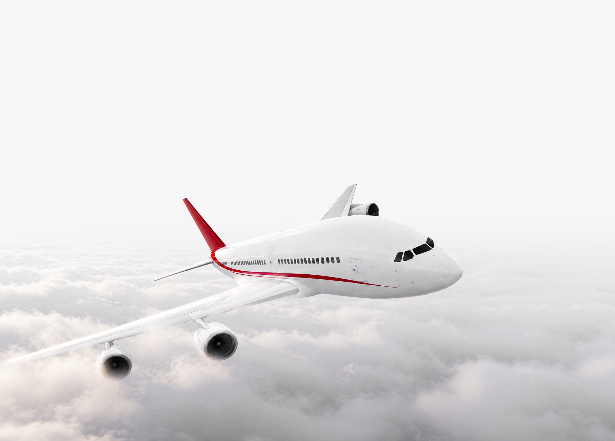 Passenger airplane flying above the clouds